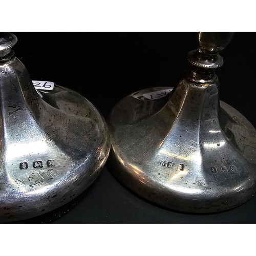 245 - 2x hallmarked silver trumpet vases, with weighted bases, both are hallmarked to the base, the weight... 