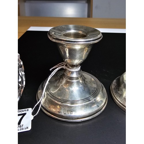 247 - A quantity of silver pieces including a Chester hallmarked silver candlestick (weighted), a Birmingh... 