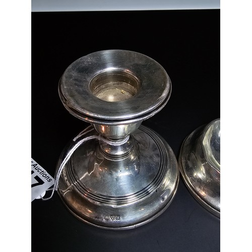 247 - A quantity of silver pieces including a Chester hallmarked silver candlestick (weighted), a Birmingh... 