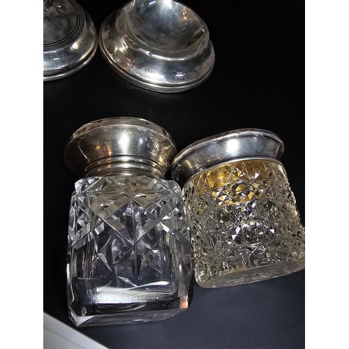 247 - A quantity of silver pieces including a Chester hallmarked silver candlestick (weighted), a Birmingh... 