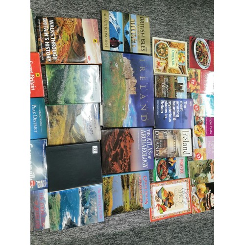 77 - A very large quantity of books including travel books, covering various areas of the UK along with a... 