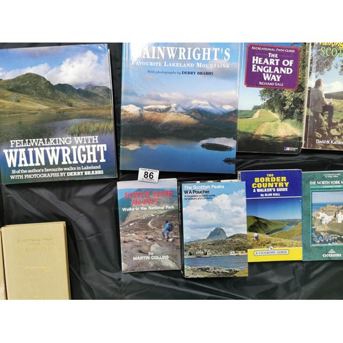 86 - A box containing a quantity of walking books including 7 Wainwrights Pictorial guides to the Lakelan... 