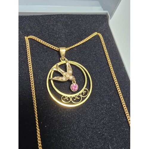 255 - 9ct Yellow Gold vintage Art Deco Pendant with a Swallow Bird Design with a Garnet gem stone drop ins... 