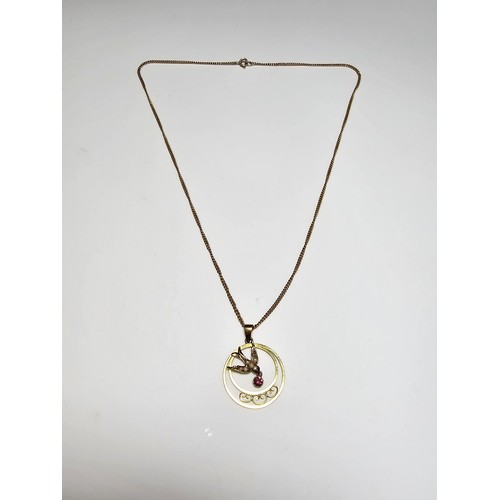 255 - 9ct Yellow Gold vintage Art Deco Pendant with a Swallow Bird Design with a Garnet gem stone drop ins... 