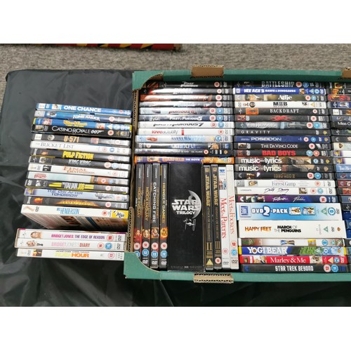 91 - A box containing a large quantity of over 100 DVD's including film, box sets, trilogies, including t... 