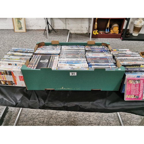 91 - A box containing a large quantity of over 100 DVD's including film, box sets, trilogies, including t... 