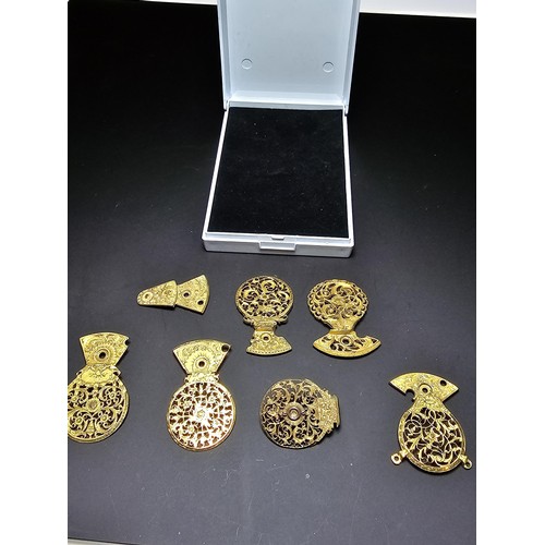 257 - Quantity of various ornate pierced gilt pocket watch parts, 1x of the parts has been re-fashioned in... 