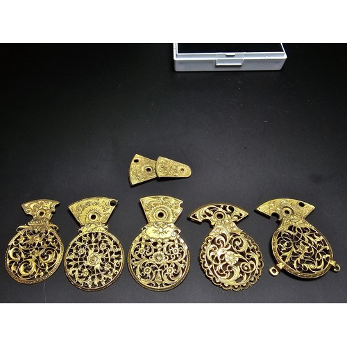 257 - Quantity of various ornate pierced gilt pocket watch parts, 1x of the parts has been re-fashioned in... 