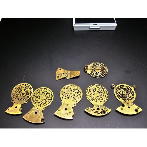 257 - Quantity of various ornate pierced gilt pocket watch parts, 1x of the parts has been re-fashioned in... 