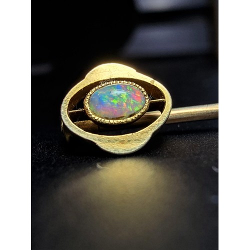 258 - 2x antique 15ct Yellow Gold Stick pins, 1x which is inset with a beautiful natural Opal stone presen... 