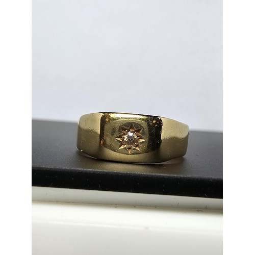 262 - 18ct Yellow Gold Gents Ring inset with a Diamond to the centre. The ring has a weight of 5.24 grams ... 