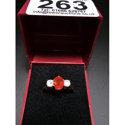 263 - Stunning Hallmarked 9ct Yellow Gold Dress Ring inset with a orange crystal CZ stone and 2x clear cry... 