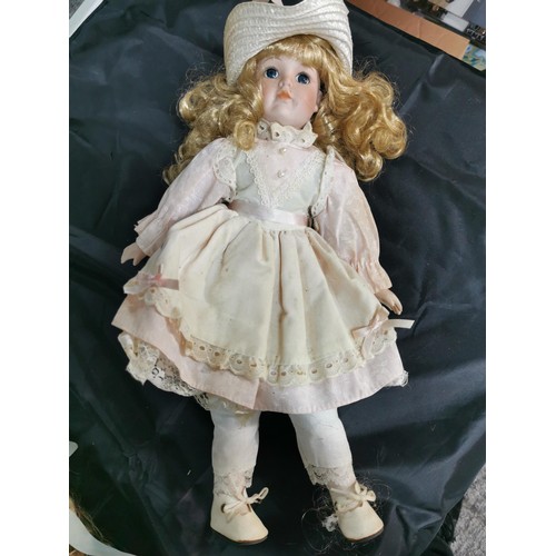 97 - A box containing a quantity of 6 bisque head dolls in various Victorian attire, all are unstamped.