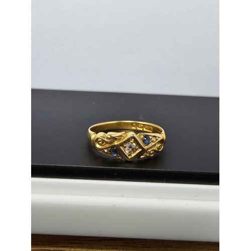 265 - An Antique Hallmarked 18ct Yellow Gold Ring with a pretty design inset with a 0.64ct Diamond to the ... 