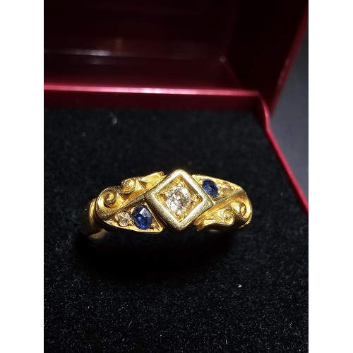 265 - An Antique Hallmarked 18ct Yellow Gold Ring with a pretty design inset with a 0.64ct Diamond to the ... 