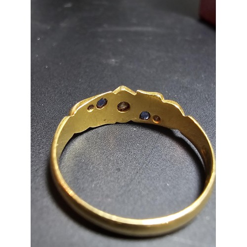 265 - An Antique Hallmarked 18ct Yellow Gold Ring with a pretty design inset with a 0.64ct Diamond to the ... 