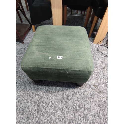 465 - An IKEA footstool in a green hard wearing material. Height 38cm and 54cm2.