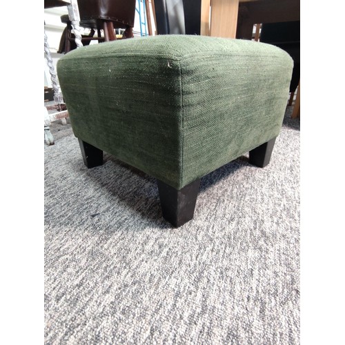 465 - An IKEA footstool in a green hard wearing material. Height 38cm and 54cm2.