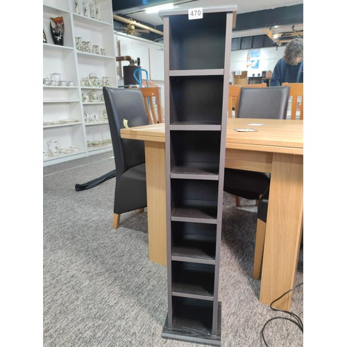 470 - A modern 6 shelf black storage unit in overall good condition. Height of 106cm, length 22cm, depth 1... 