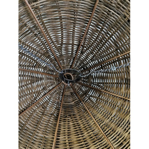 80 - A quantity of wicker ware including 2 ceiling uplighters a large wicker basket, an a double handled ... 