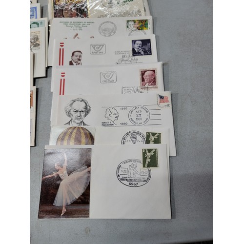 64 - 2x large stacks of Stamped First Day covers mostly are British with a small quantity of world covers... 