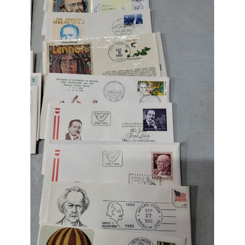 64 - 2x large stacks of Stamped First Day covers mostly are British with a small quantity of world covers... 