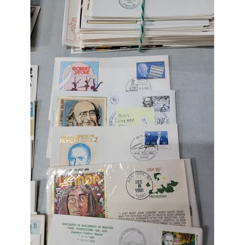 64 - 2x large stacks of Stamped First Day covers mostly are British with a small quantity of world covers... 