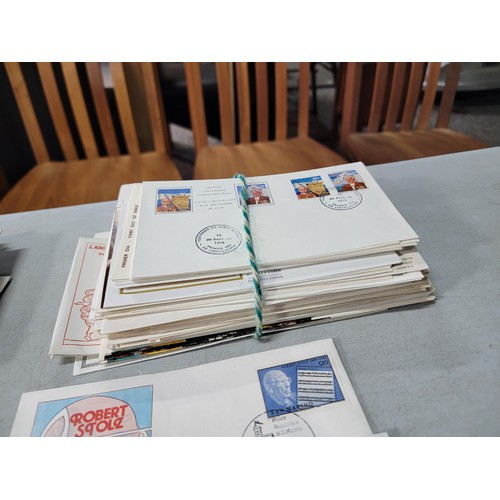 64 - 2x large stacks of Stamped First Day covers mostly are British with a small quantity of world covers... 