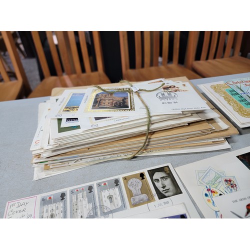 64 - 2x large stacks of Stamped First Day covers mostly are British with a small quantity of world covers... 