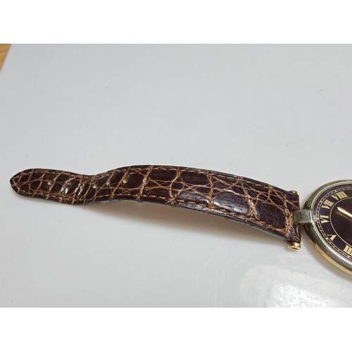 249B - A good quality genuine ladies Cartier watch, 925 silver gold plated with the flower and duck emblem ... 