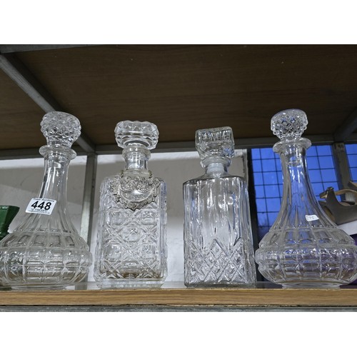 448 - A quantity of 4 pressed glass decanters including 2 port decanters and 2 whisky decanters. 1 whisky ... 