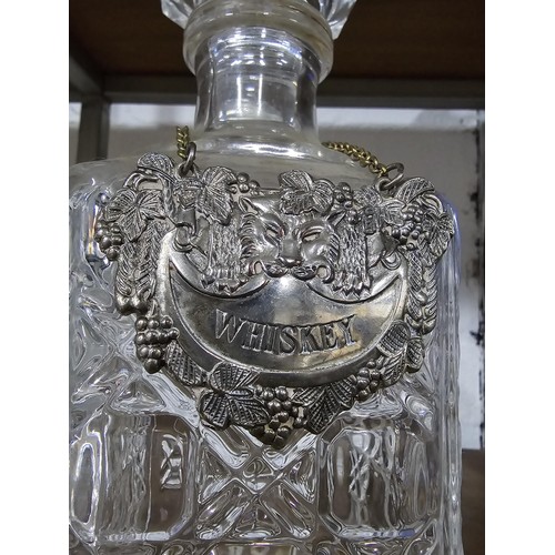 448 - A quantity of 4 pressed glass decanters including 2 port decanters and 2 whisky decanters. 1 whisky ... 