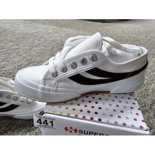 441 - A boxed pair of new and unused super GA size 2.5 trainers.