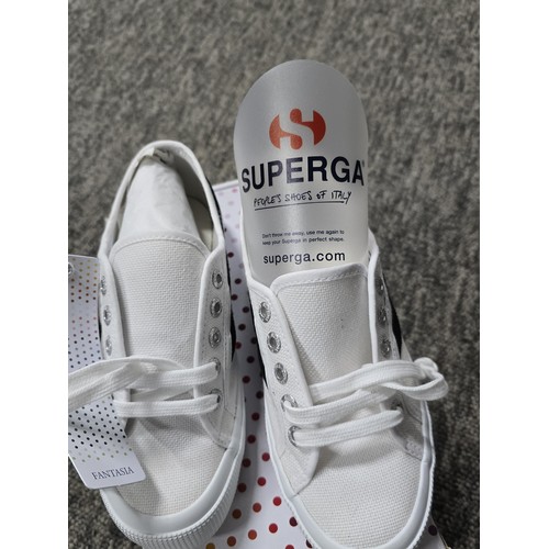 441 - A boxed pair of new and unused super GA size 2.5 trainers.