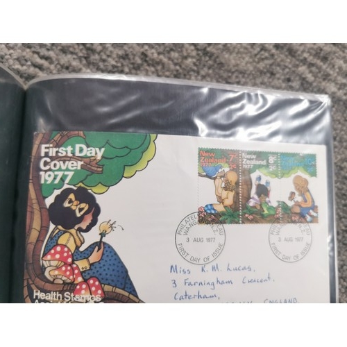 113 - 2 albums containing a large quantity of first day covers organised by date. 1 from New Zealand datin... 