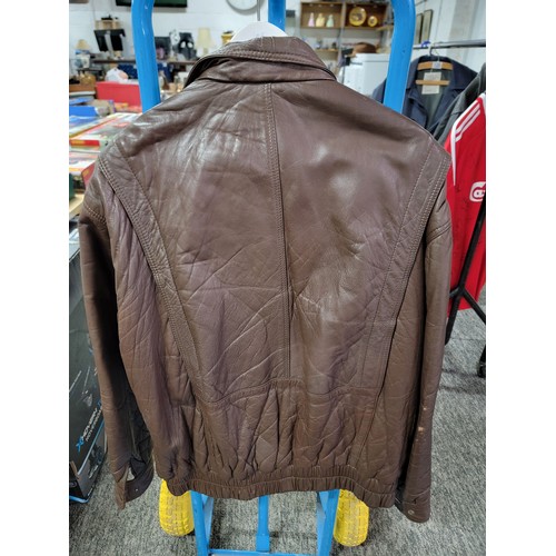 118 - A Fatigue real leather gents jacket in brown. In good overall condition, size 46.