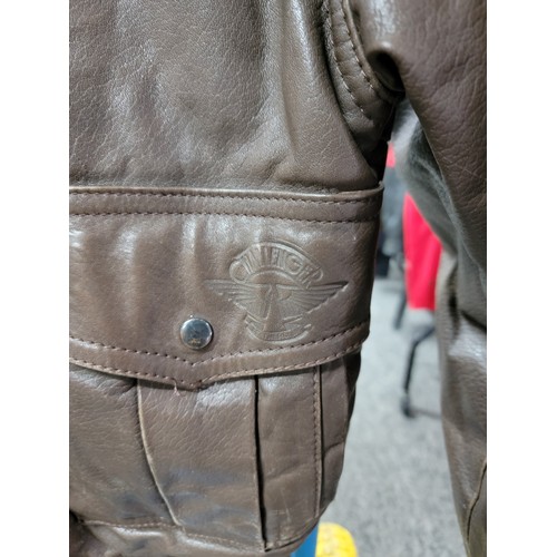 119 - A genuine leather brown motorcycle style gents jacket by Challenger, in good overall condition.