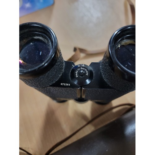 66 - A pair of good quality vintage Carl Zeiss Dialyt 8x30B binoculars with their original case and instr... 