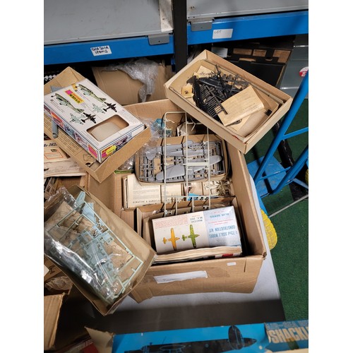 92 - 6 boxes containing a very large quantity of airfix models of military aircraft, all are opened, some... 