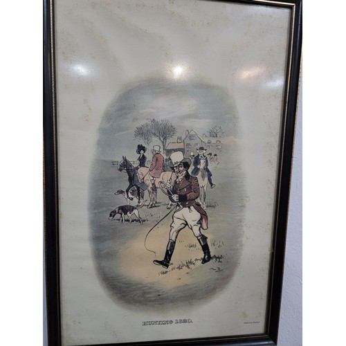 132 - A collection of 4 framed and glazed vintage prints of Johnnie Walker (whisky) depicting hunting, gol... 