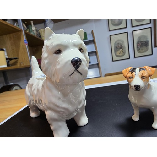 213 - 2x Beswick dog figures to inc a Jack Russell and a Westie both in excellent condition with no damage... 