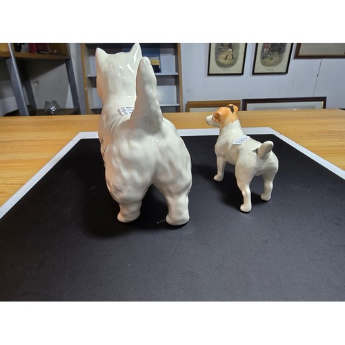 213 - 2x Beswick dog figures to inc a Jack Russell and a Westie both in excellent condition with no damage... 