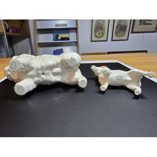 213 - 2x Beswick dog figures to inc a Jack Russell and a Westie both in excellent condition with no damage... 