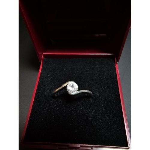 229 - pretty 925 silver solitaire ring inset with a cz crystal stone. in good condition boxed, size K.5