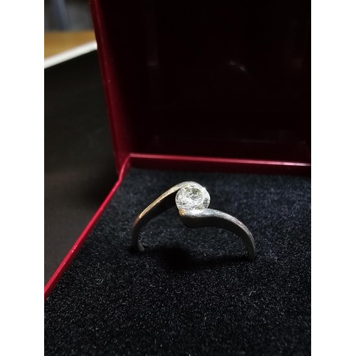 229 - pretty 925 silver solitaire ring inset with a cz crystal stone. in good condition boxed, size K.5