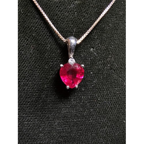 231 - Stunning 925 silver pendant inset with a heart shaped pink/red topaz stone & a small clear topaz sto... 