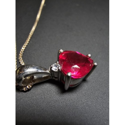 231 - Stunning 925 silver pendant inset with a heart shaped pink/red topaz stone & a small clear topaz sto... 