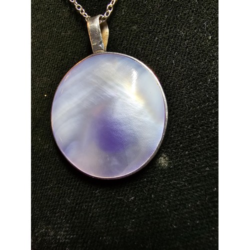 232 - Stunning 925 silver pendant inset with blue/purple Mother of pearl present excellent flashing colour... 