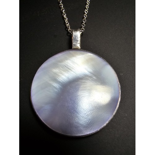 232 - Stunning 925 silver pendant inset with blue/purple Mother of pearl present excellent flashing colour... 