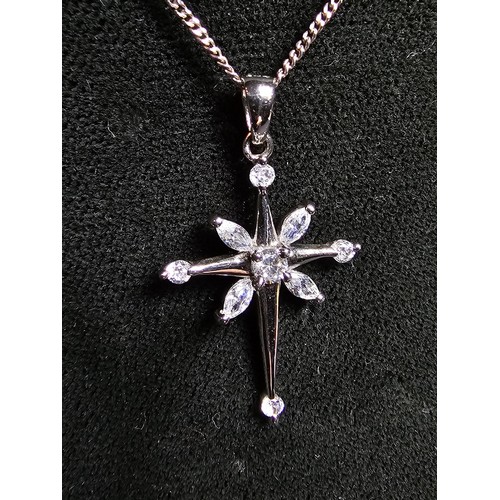 242 - Pretty 925 silver Star formed pendant inset with sparkly cz crystal stones set on a 18